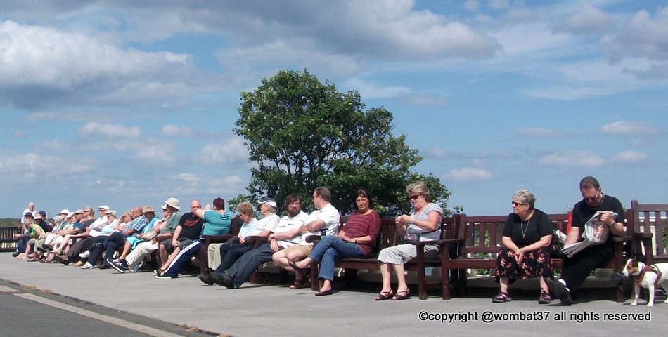People enjoying a brass band concert in Filey, Yorkshire
